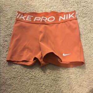 Nike Pro Coral Athletic Shorts